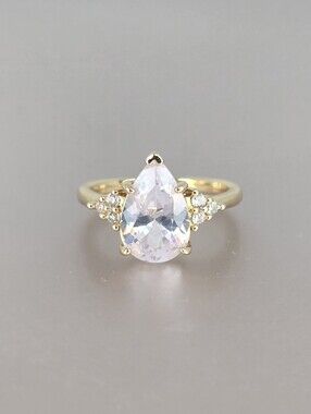Gold Pear-Cut Gem Ring with Side Accent Stones